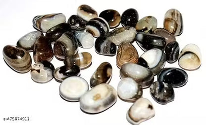 Assorted colored stones on a white background